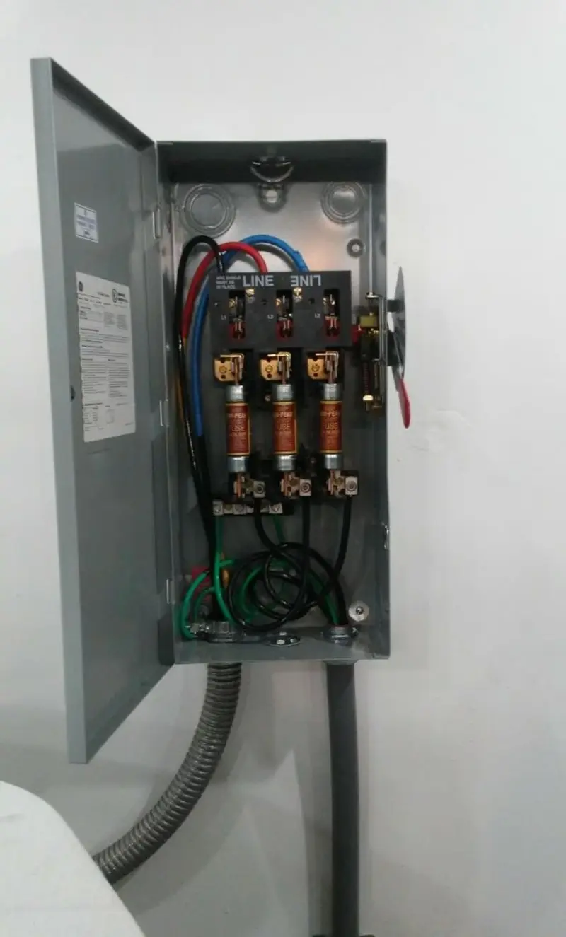 Three-phase disconnect switch installed for Smoke Detector Installation in Travis Ranch