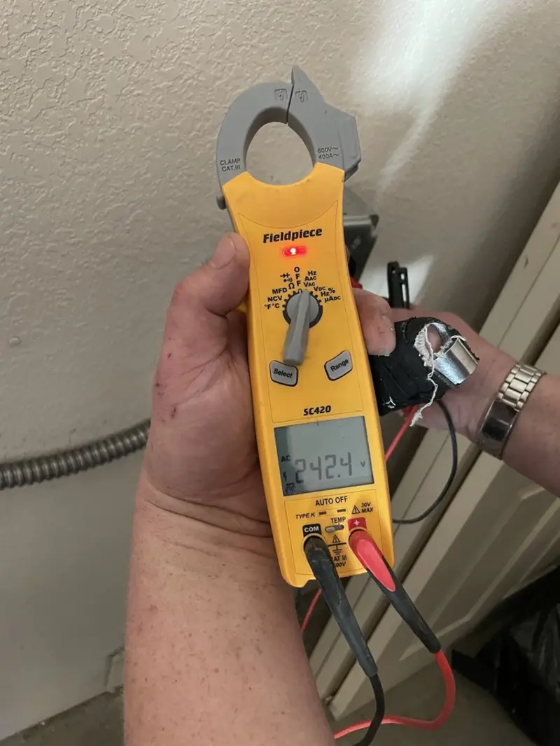 Voltage testing with clamp meter during Hot Tub / Pool Electrical Wiring in Travis Ranch